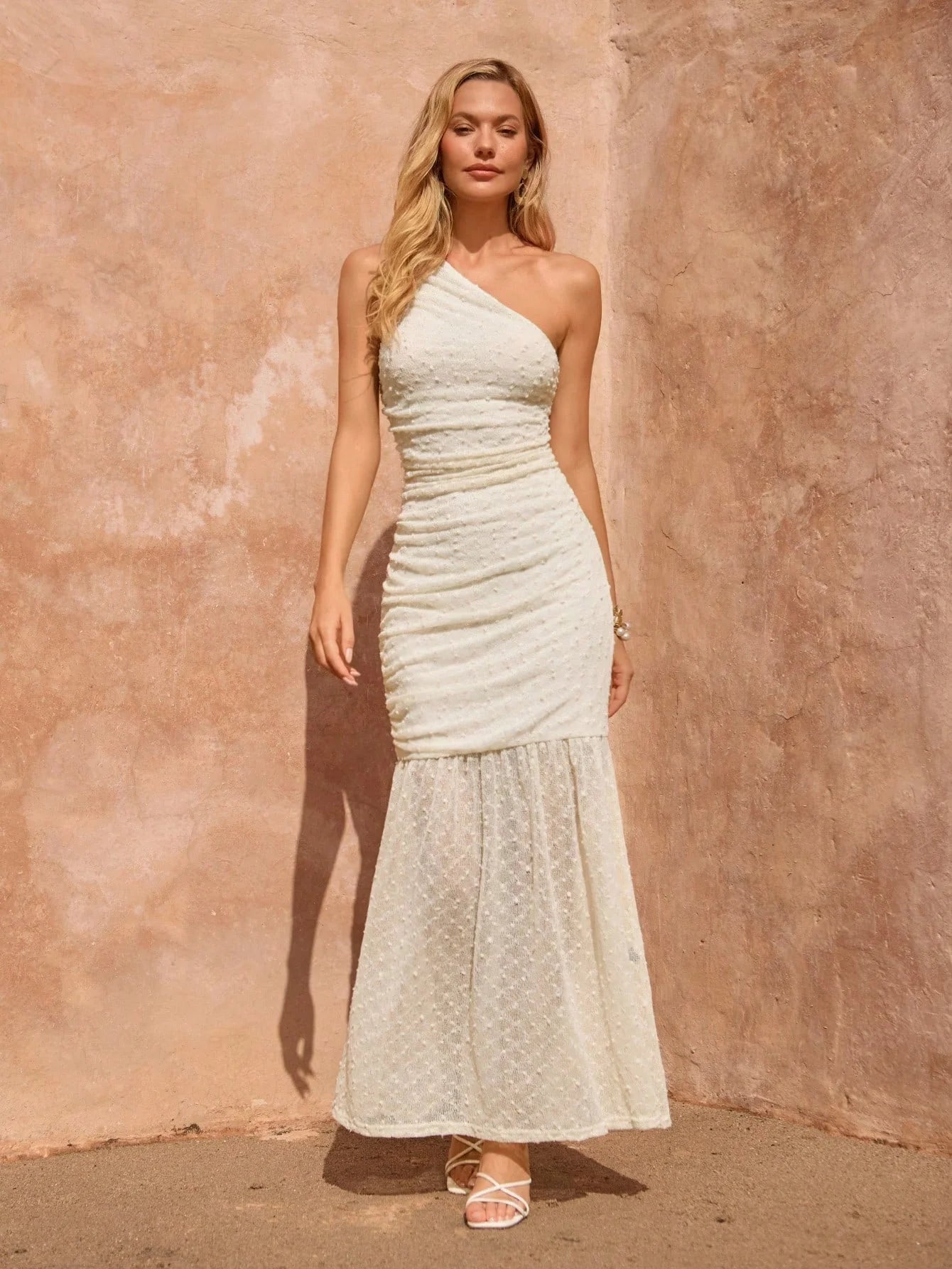 A new sexy off-the-shoulder, form-fitting, pleated and hip-hugging long dress for women in summer